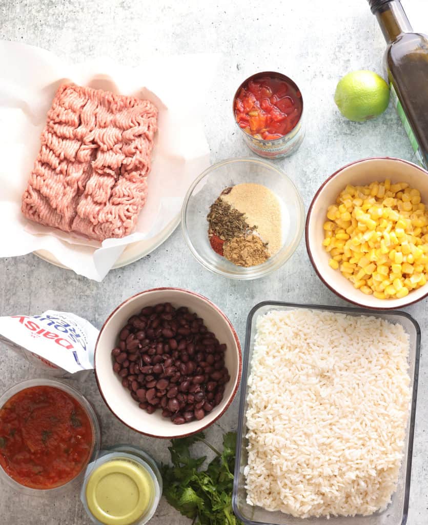 ingredients for ground turkey taco bowls all laid out
