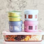 cooked food in colorful containers