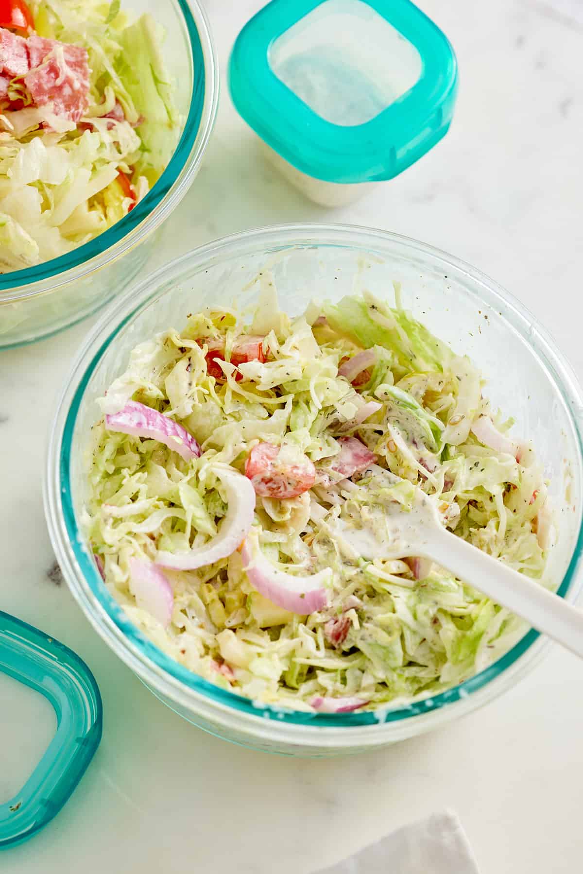 grinder salad recipe in bowl with fork sticking out