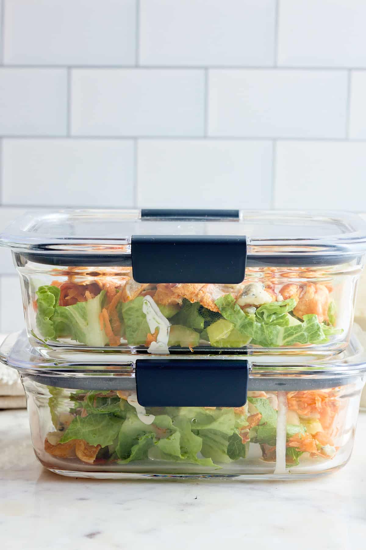 buffalo chicken salads packed for lunch in containers